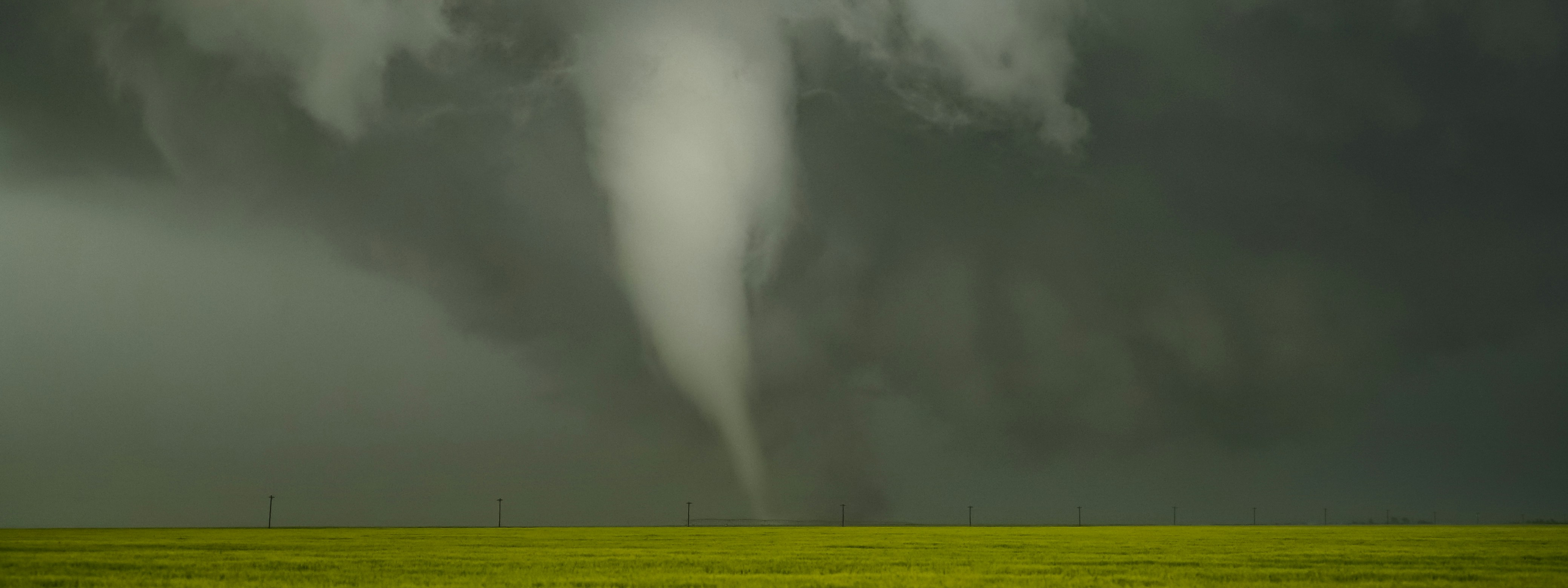 X-band phased-array radar data assimilation sharpens high-resolution simulation of a westerly weak tornado